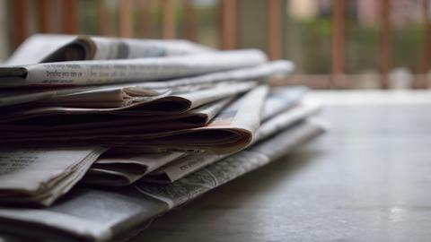 a stack of newspapers