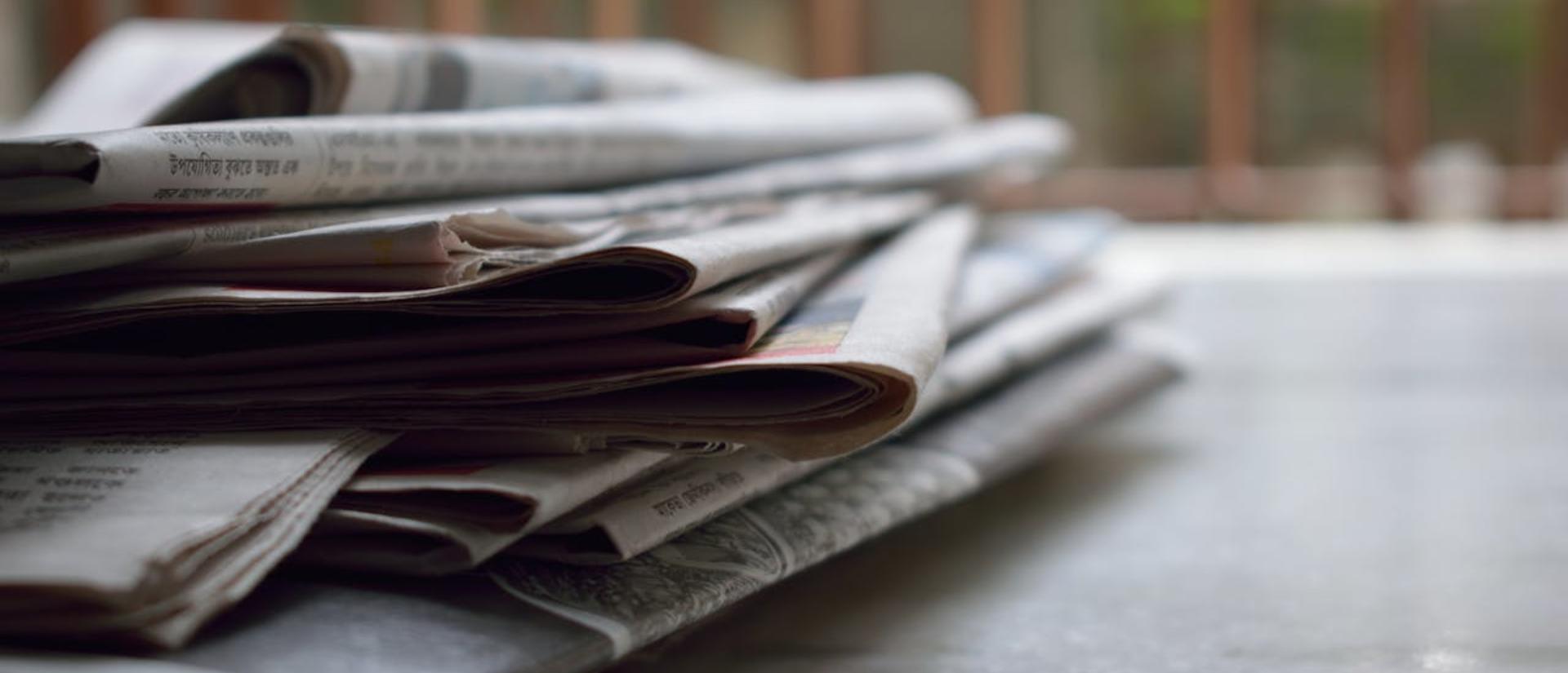 a stack of newspapers